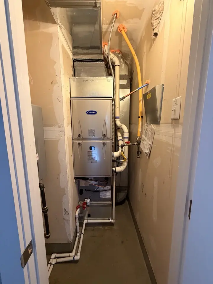 Carrier furnace installed in a closet by Mighty Pine
