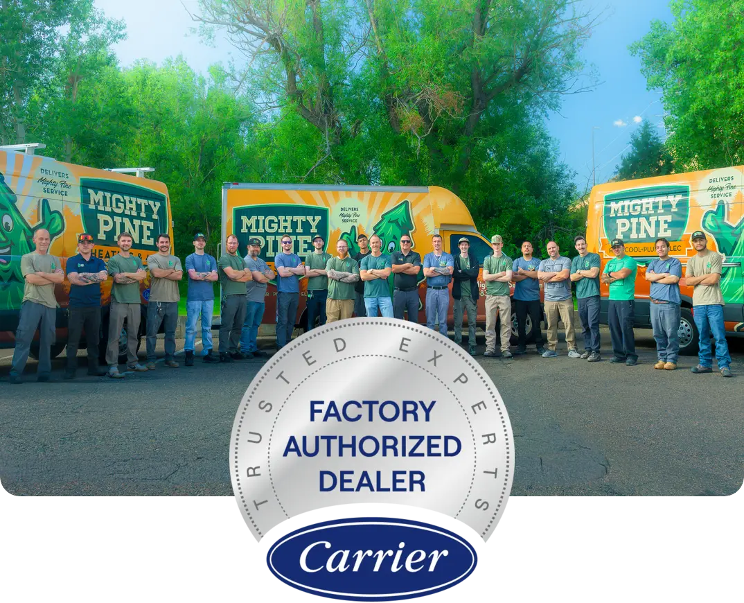 The Mighty Pine team with the Carrier Factory Authorized Dealer badge.