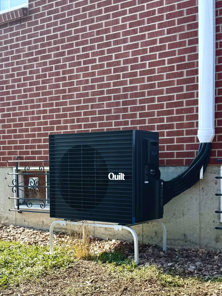 Quilt heat pump outdoor unit installed by Mighty Pine