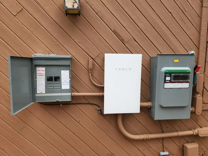 Tesla energy equipment and electrical panels installed by Mighty Pine