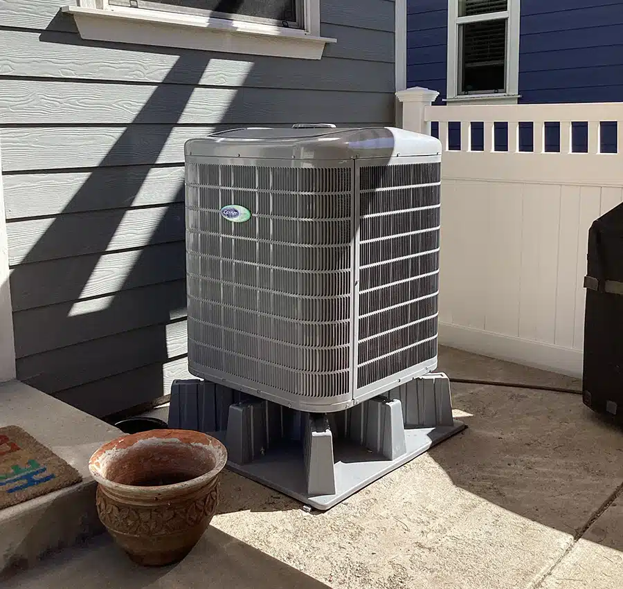 Air Conditioning installation outside of residential home in Arvada, CO.